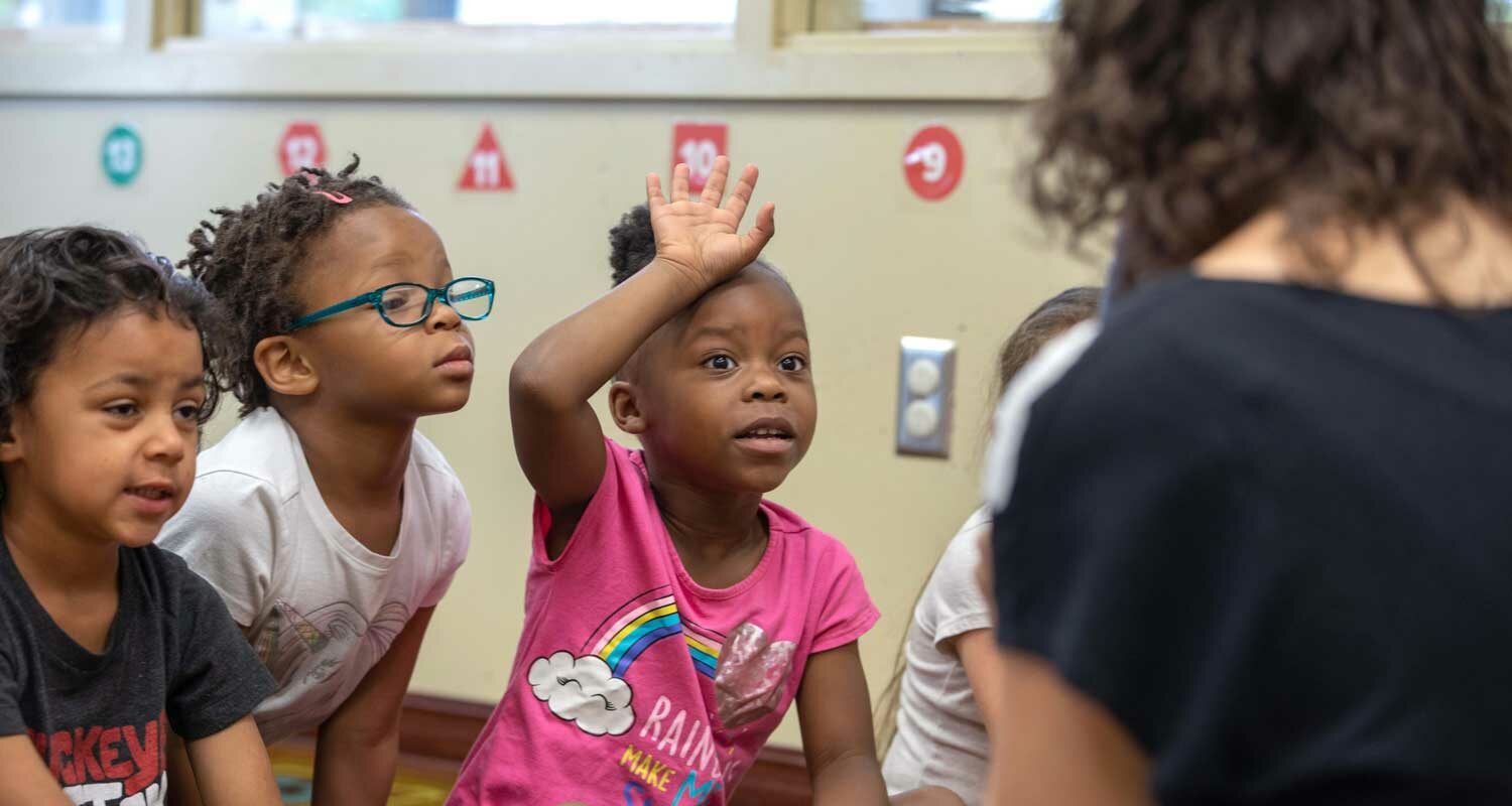 “What are the children doing with the chalk?” the teacher asks. “They’re putting it back where they found it,” Kanasia Brown says.