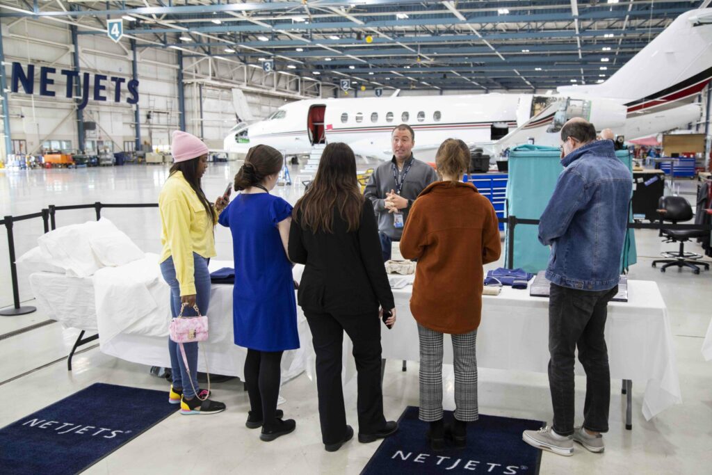 Ohio State students on a tour in the NetJets hanger