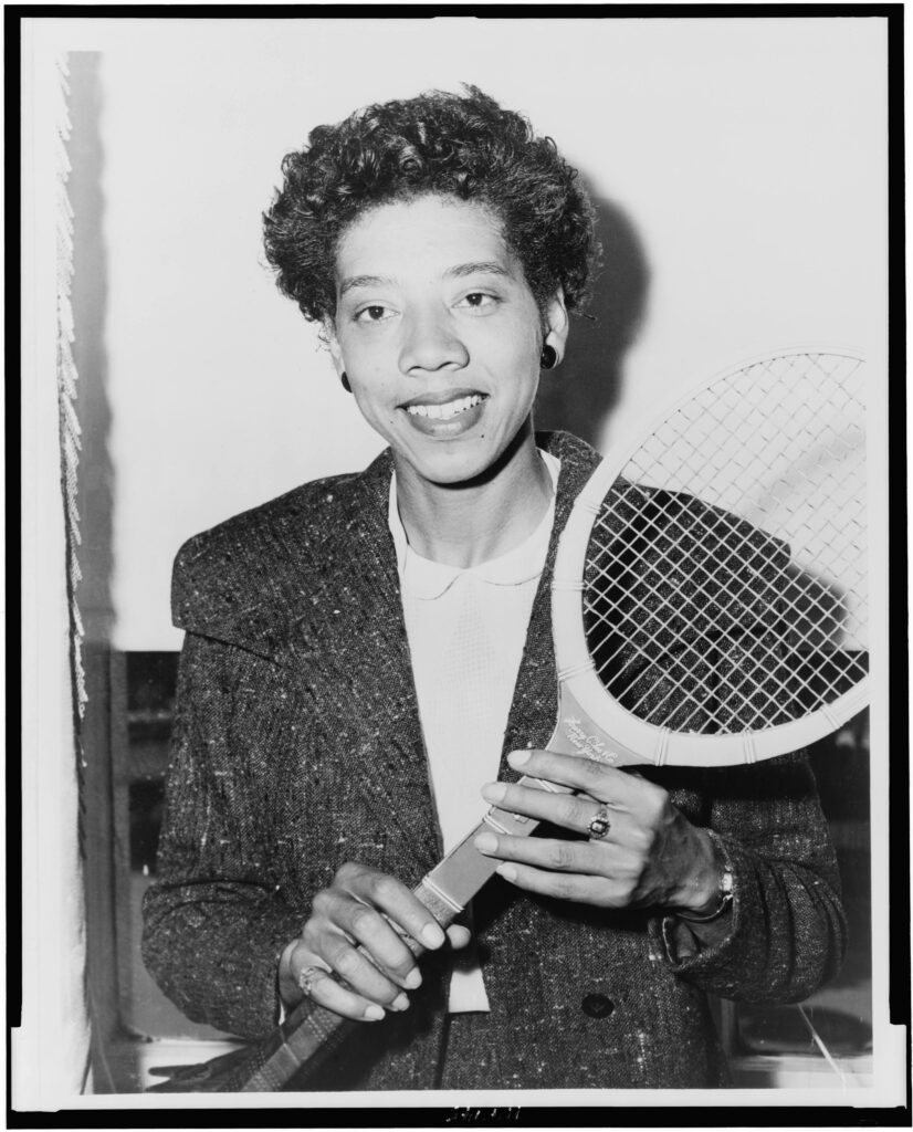 Althea Gibson black and white photo holding tennis racket