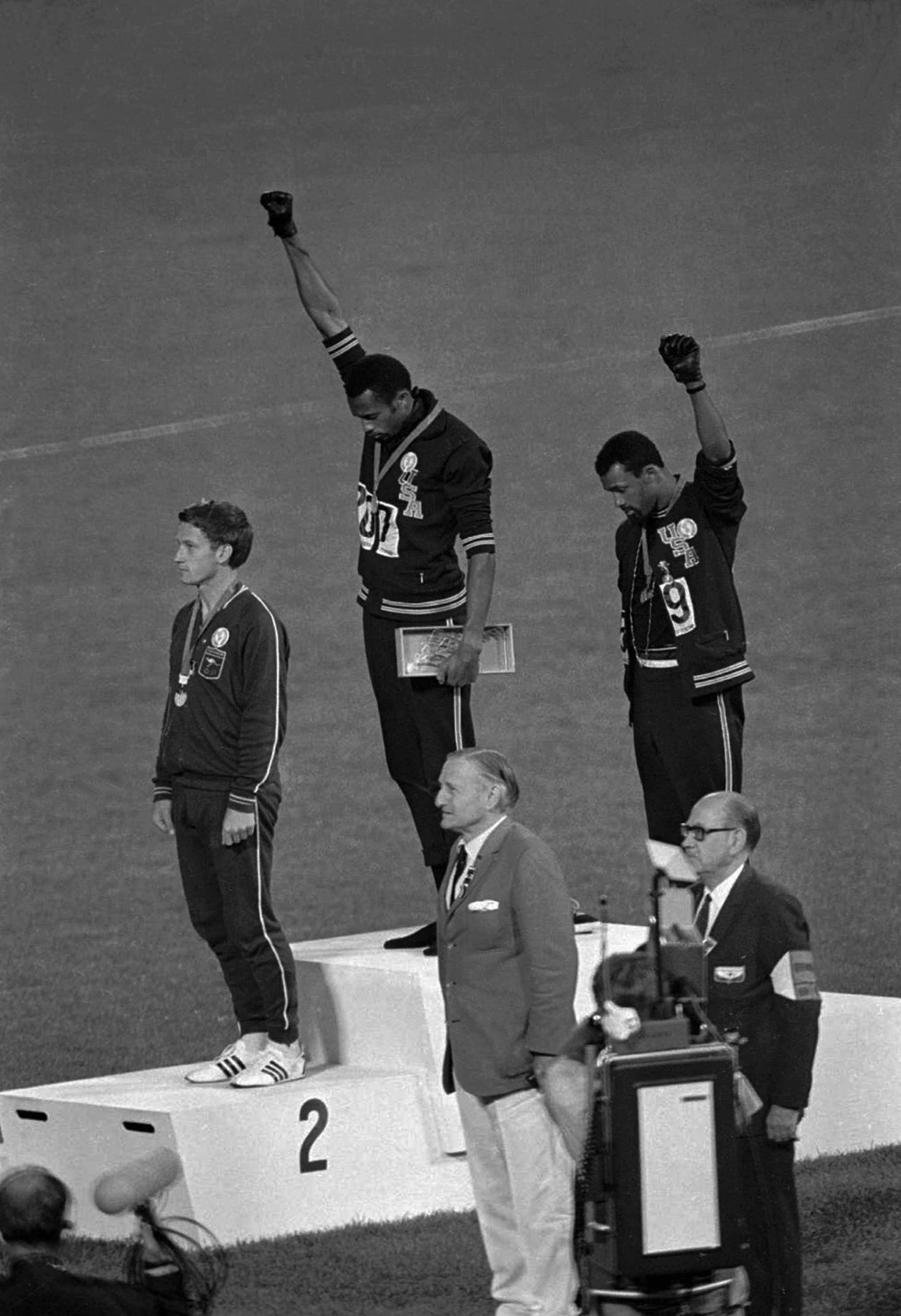 John Carlos and Tommie Smith raise their fists in protest at the 1968 Olympic Games
