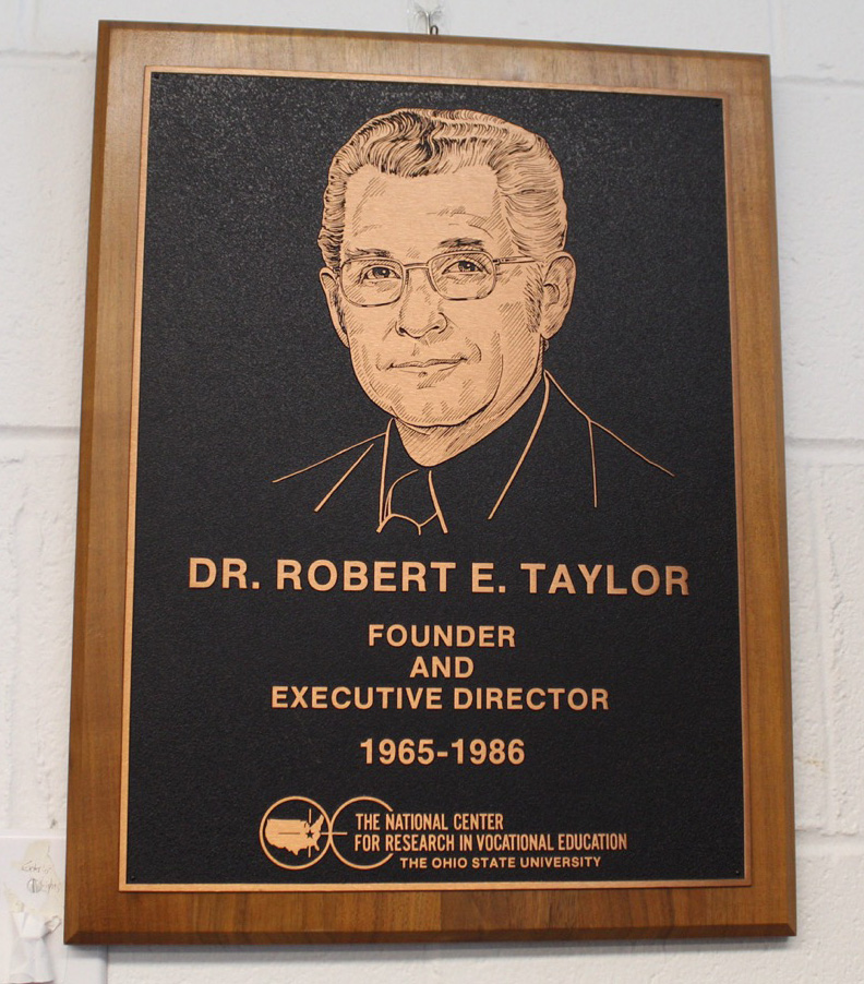 Plaque hanging on a wall of Center on Education and Training for Employment for Dr. Robert E. Taylor