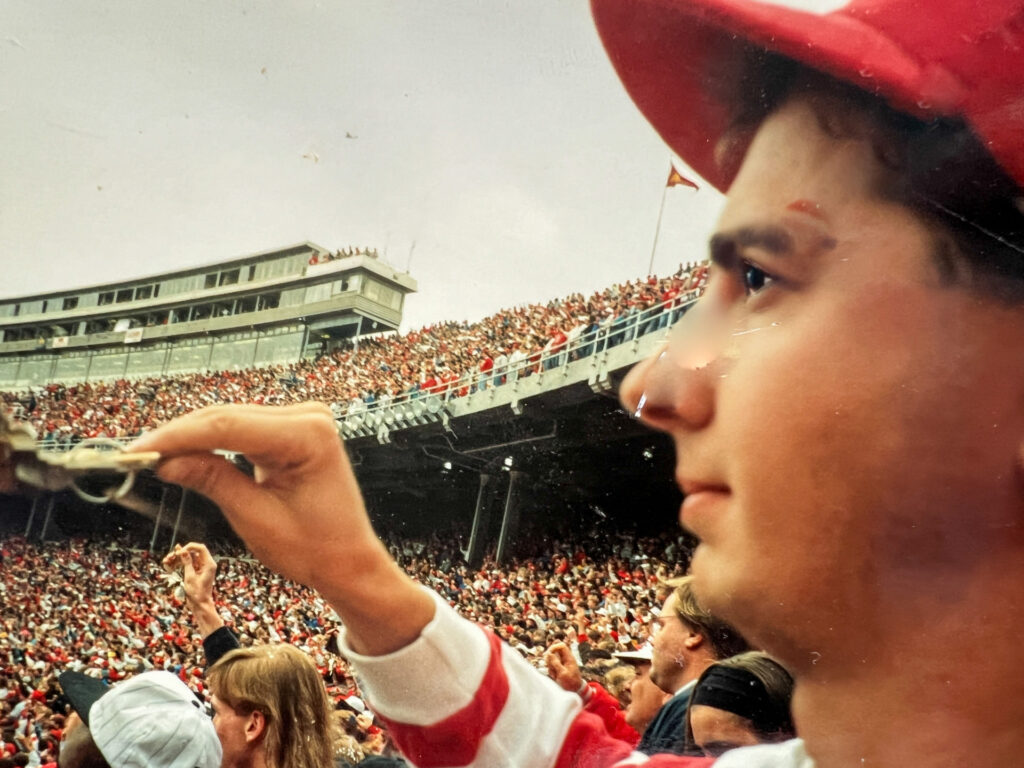 Kucinski as an Ohio State student in the stands during a football game.